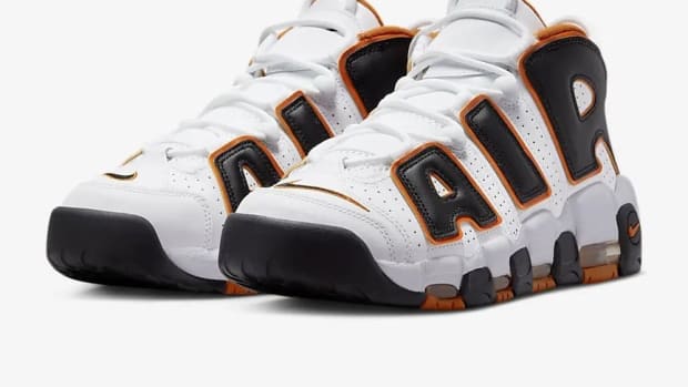 Side view of Scottie Pippen's white and black Nike sneakers.